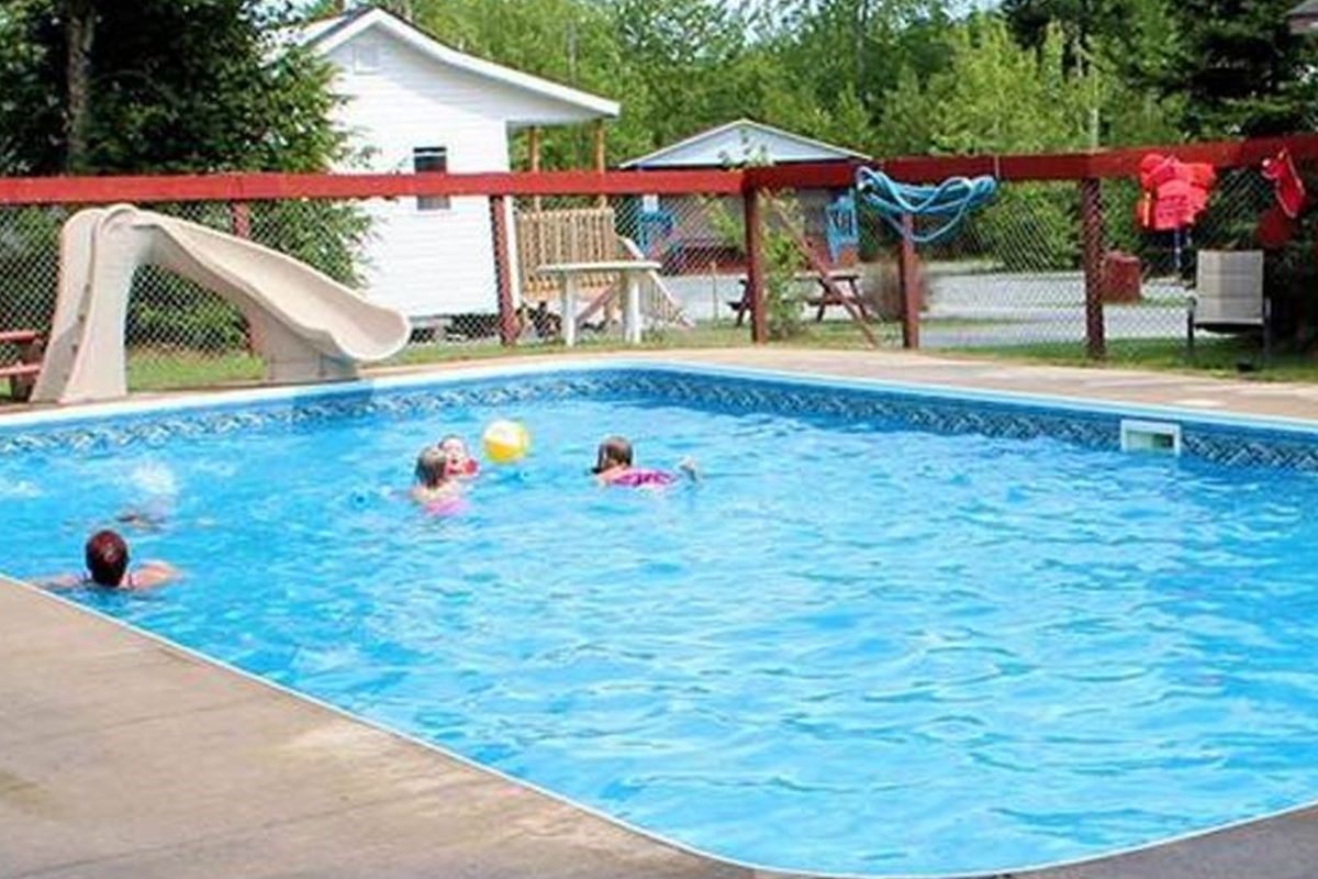 children playing in swimming pool