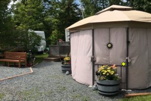 hut on a campsite with garden